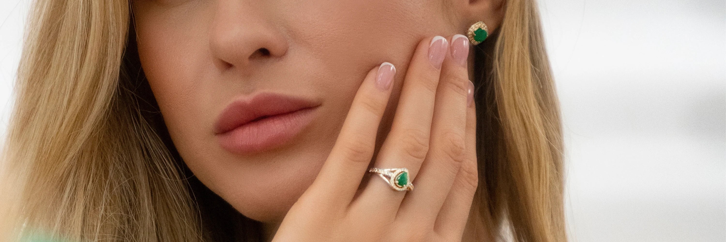 Cavell Tear Drop of Joy collection cover image featuring a woman wearing a teardrop-shaped gemstone ring, symbolizing elegance, vulnerability, and hidden rose quartz for inner peac