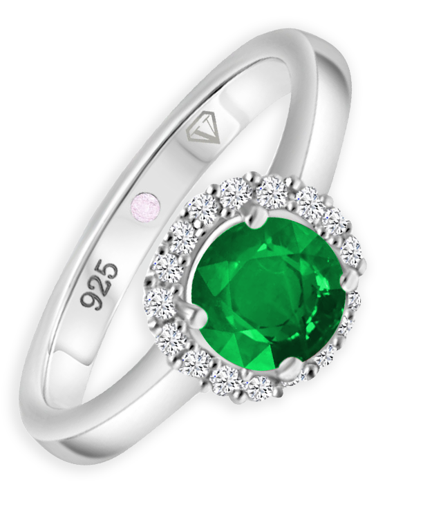 Angled view of Cavell Eternal Love sterling silver ring featuring a natural emerald gemstone surrounded by round-cut cubic zirconia accents and hidden rose quartz gemstone inside the band