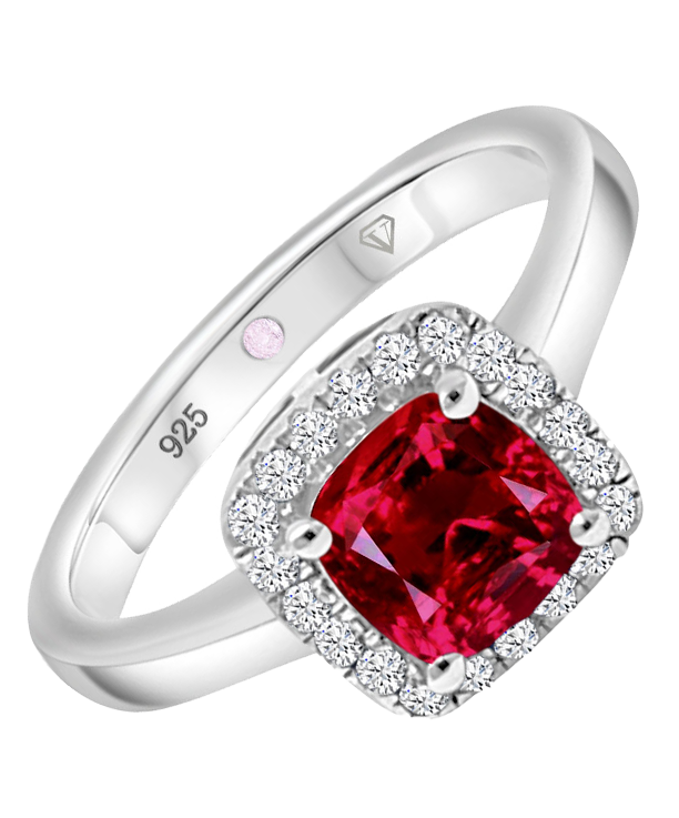 Angled view of Cavell Touch of Luxury sterling silver ring featuring a natural ruby gemstone surrounded by round-cut cubic zirconia accents and hidden rose quartz gemstone inside the band