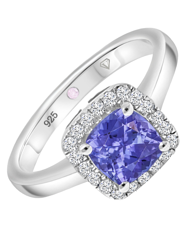 Angled view of Cavell Touch of Luxury sterling silver ring featuring a natural tanzanite gemstone surrounded by round-cut cubic zirconia accents and hidden rose quartz gemstone inside the band