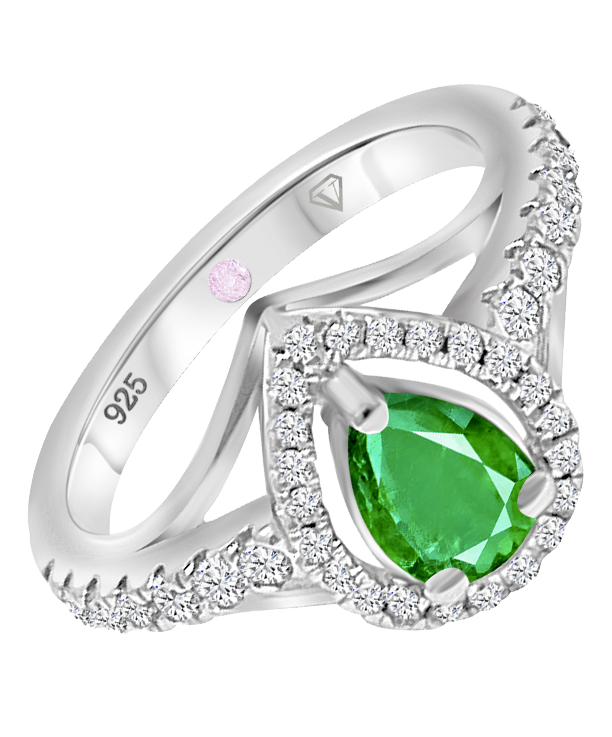 Angled view of Cavell Tear Drop of Joy sterling silver ring featuring a pear-shaped natural emerald surrounded by round-cut cubic zirconia accents and hidden rose quartz gemstone inside the band
