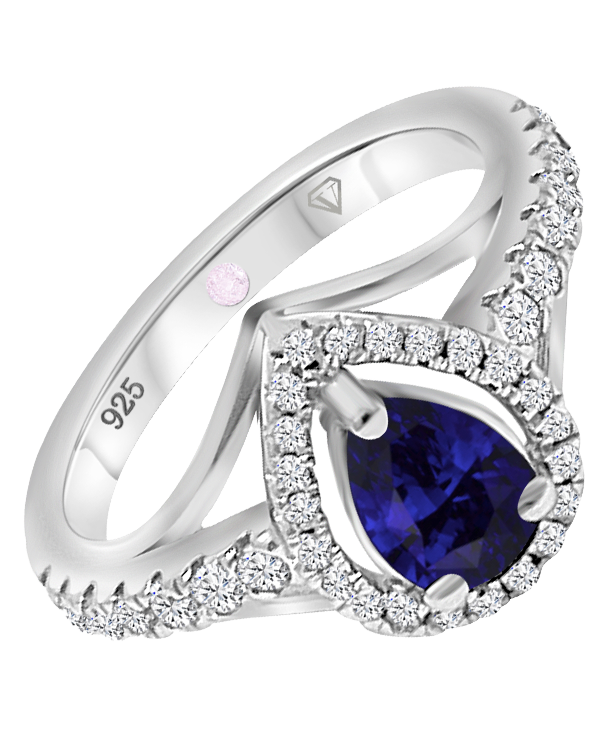 Angled view of Cavell Tear Drop of Joy sterling silver ring featuring a pear-shaped natural sapphire surrounded by round-cut cubic zirconia accents and hidden rose quartz gemstone inside the band
