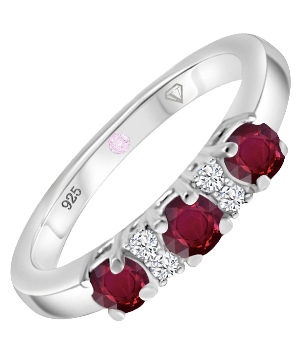 Angled view of Cavell Trilogy of Loyalty sterling silver ring featuring a natural ruby gemstone surrounded by round-cut cubic zirconia accents and hidden rose quartz gemstone inside the band