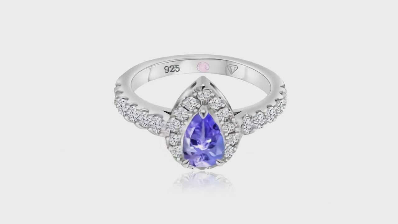 360° video of Cavell Drop of Passion natural tanzanite ring in sterling silver surrounded by round-cut cubic zirconia accents with hidden rose quartz gemstone inside