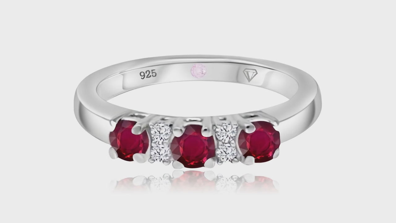 360° video of Cavell Trilogy of Loyalty natural ruby ring in sterling silver surrounded by round-cut cubic zirconia accents with hidden rose quartz gemstone inside