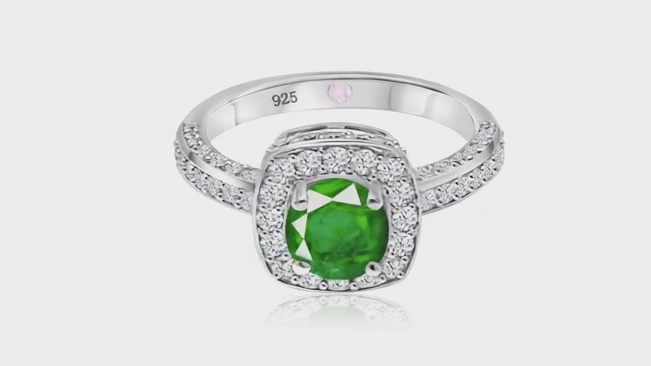 360° video of Cavell Everlasting Devotion natural emerald ring in sterling silver surrounded by round-cut cubic zirconia accents with hidden rose quartz gemstone inside