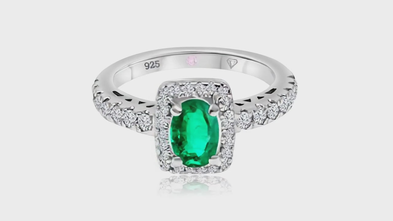 360° video of Cavell Feel Timeless natural emerald ring in sterling silver surrounded by round-cut cubic zirconia accents with hidden rose quartz gemstone inside