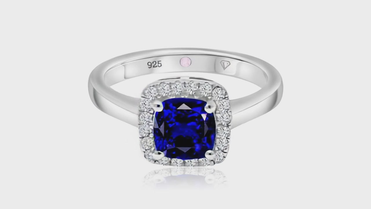 360° video of Cavell Touch of Luxury natural sapphire ring in sterling silver surrounded by round-cut cubic zirconia accents with hidden rose quartz gemstone inside