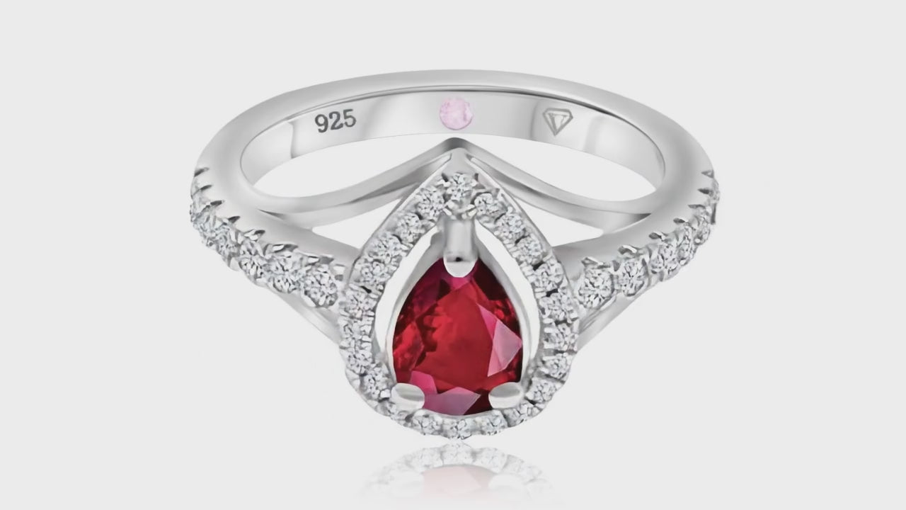 360° video of Cavell Tear Drop of Joy natural ruby ring in sterling silver surrounded by round-cut cubic zirconia accents with hidden rose quartz gemstone inside