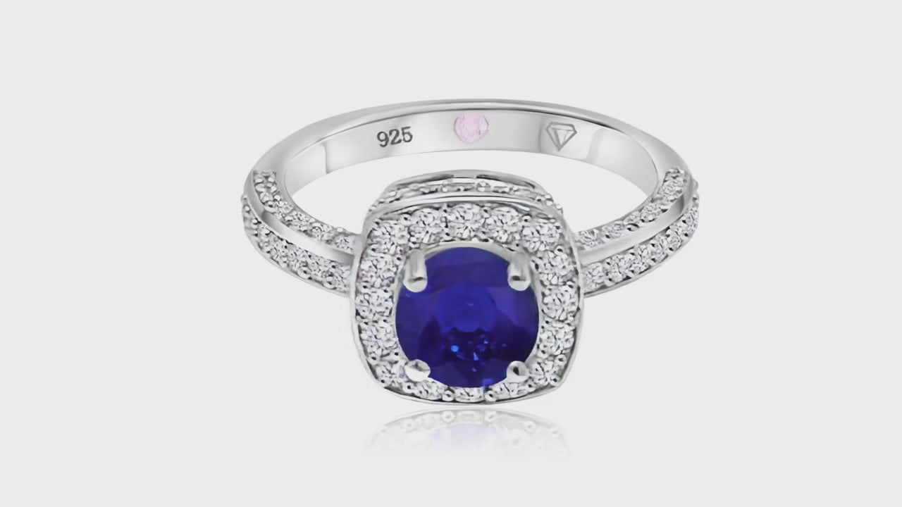 360° video of Cavell Everlasting Devotion natural sapphire ring in sterling silver surrounded by round-cut cubic zirconia accents with hidden rose quartz gemstone inside