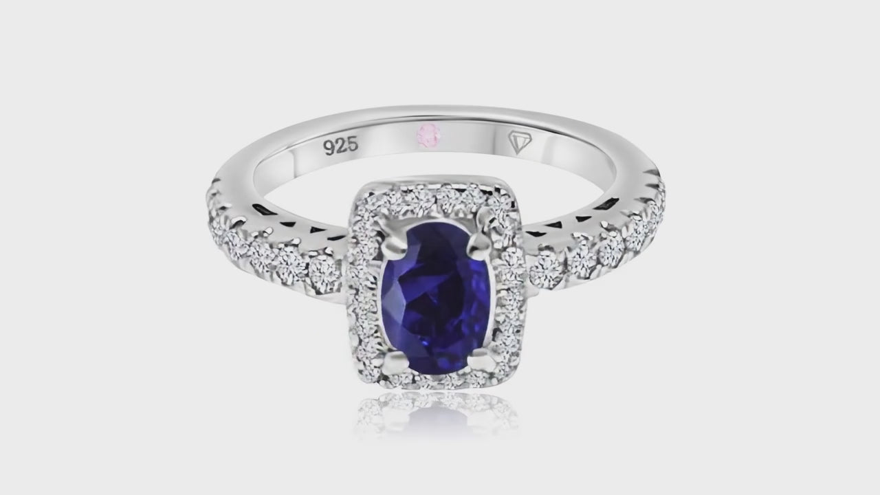 360° video of Cavell Feel Timeless natural sapphire ring in sterling silver surrounded by round-cut cubic zirconia accents with hidden rose quartz gemstone inside