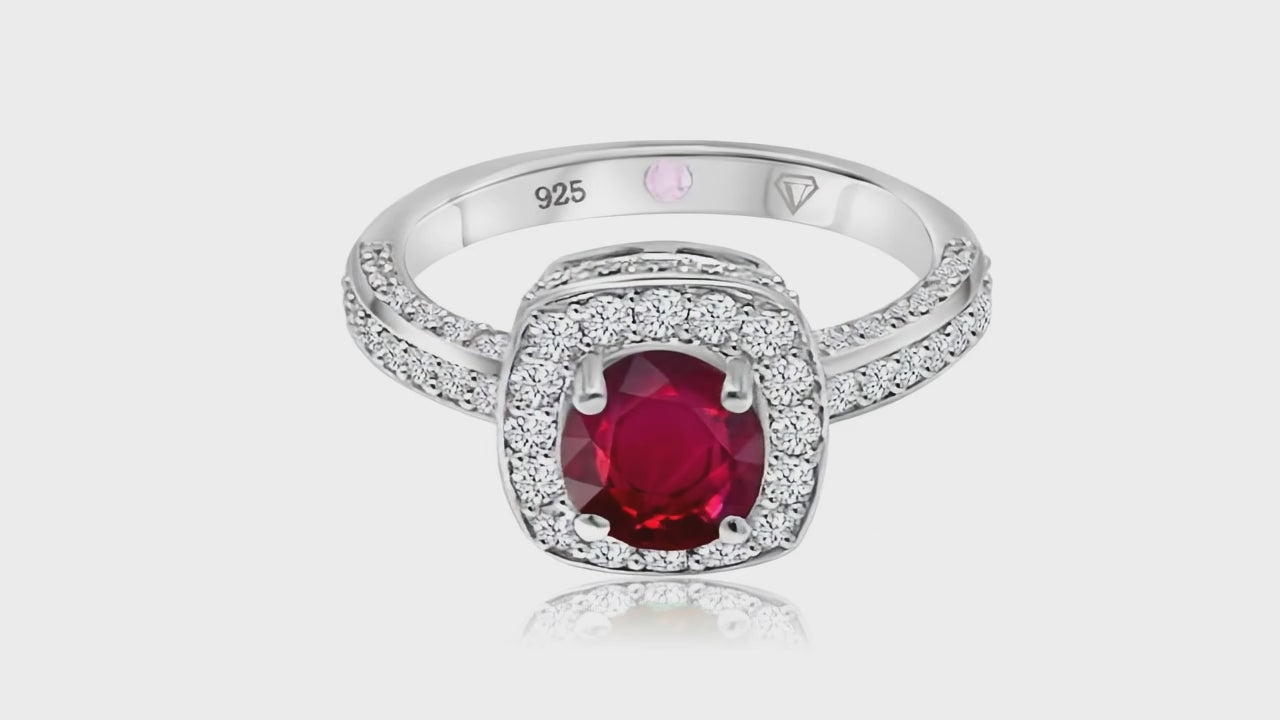 360° video of Cavell Everlasting Devotion natural ruby ring in sterling silver surrounded by round-cut cubic zirconia accents with hidden rose quartz gemstone inside