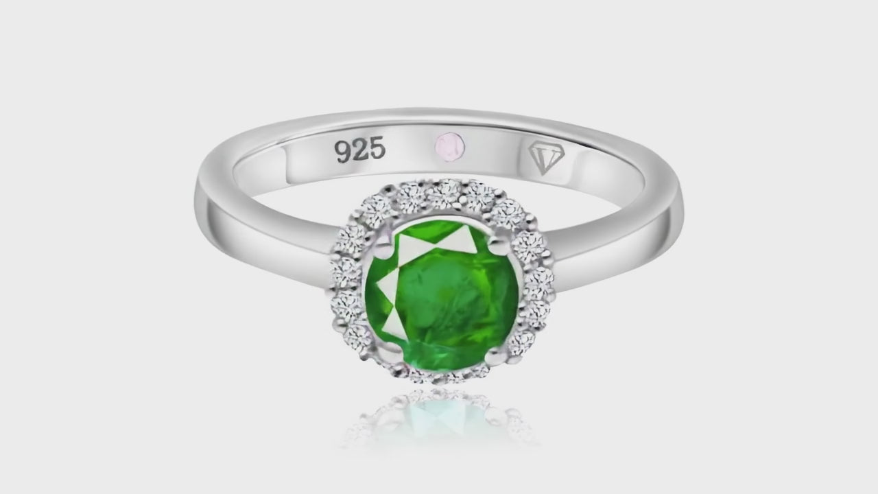 360° video of Cavell Eternal Love natural emerald ring in sterling silver surrounded by round-cut cubic zirconia accents with hidden rose quartz gemstone inside