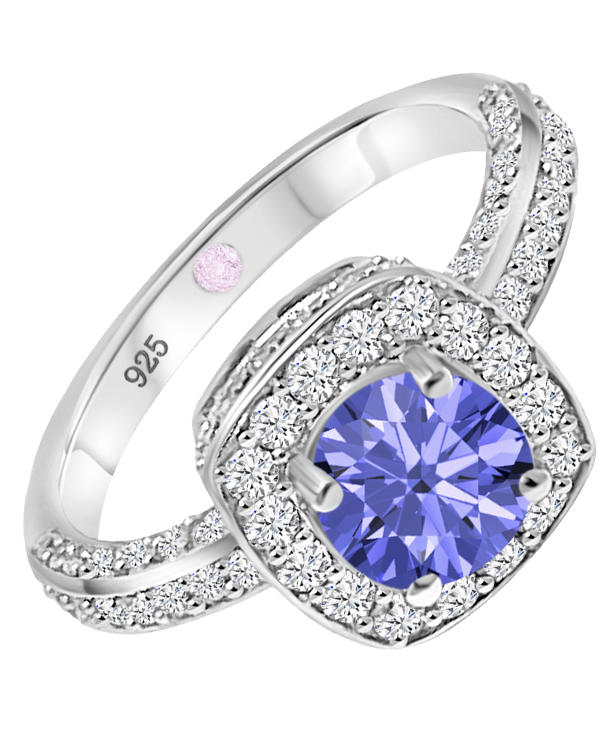 Angled view of Cavell Everlasting Devotion sterling silver ring featuring a natural tanzanite gemstone surrounded by round-cut cubic zirconia accents and hidden rose quartz gemstone inside the band