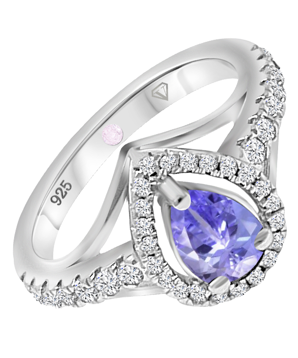 Angled view of Cavell Tear Drop of Joy sterling silver ring featuring a natural tanzanite gemstone surrounded by round-cut cubic zirconia accents and hidden rose quartz gemstone inside the band