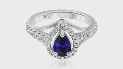 360° video of Cavell Tear Drop of Joy natural sapphire ring in sterling silver surrounded by round-cut cubic zirconia accents with hidden rose quartz gemstone inside