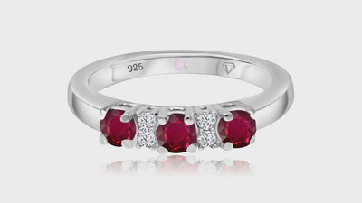 360° video of Cavell Trilogy of Loyalty natural ruby ring in sterling silver surrounded by round-cut cubic zirconia accents with hidden rose quartz gemstone inside
