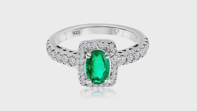360° video of Cavell Feel Timeless natural emerald ring in sterling silver surrounded by round-cut cubic zirconia accents with hidden rose quartz gemstone inside