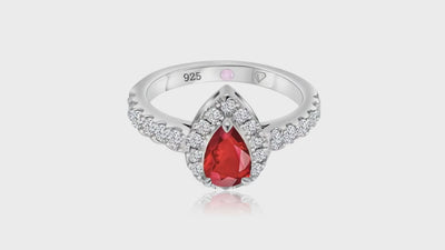 360° video of Cavell Drop of Passion natural ruby ring in sterling silver surrounded by round-cut cubic zirconia accents with hidden rose quartz gemstone inside