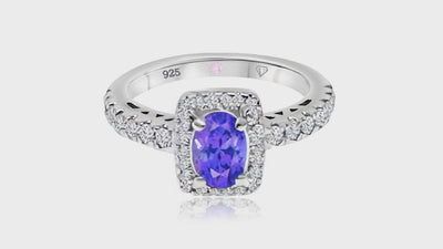 360° video of Cavell Feel Timeless natural tanzanite ring in sterling silver surrounded by round-cut cubic zirconia accents with hidden rose quartz gemstone inside
