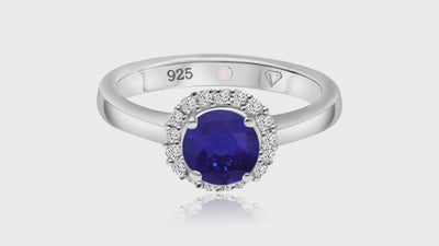 360° video of Cavell Eternal Love natural sapphire ring in sterling silver surrounded by round-cut cubic zirconia accents with hidden rose quartz gemstone inside