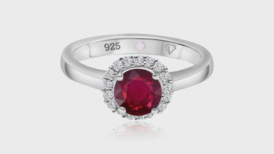 360° video of Cavell Eternal Love natural ruby ring in sterling silver surrounded by round-cut cubic zirconia accents with hidden rose quartz gemstone inside