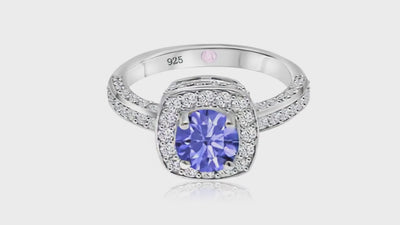 360° video of Cavell Everlasting Devotion natural tanzanite ring in sterling silver surrounded by round-cut cubic zirconia accents with hidden rose quartz gemstone inside