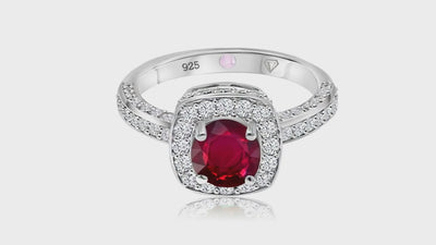 360° video of Cavell Everlasting Devotion natural ruby ring in sterling silver surrounded by round-cut cubic zirconia accents with hidden rose quartz gemstone inside