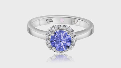 360° video of Cavell Eternal Love natural tanzanite ring in sterling silver surrounded by round-cut cubic zirconia accents with hidden rose quartz gemstone inside